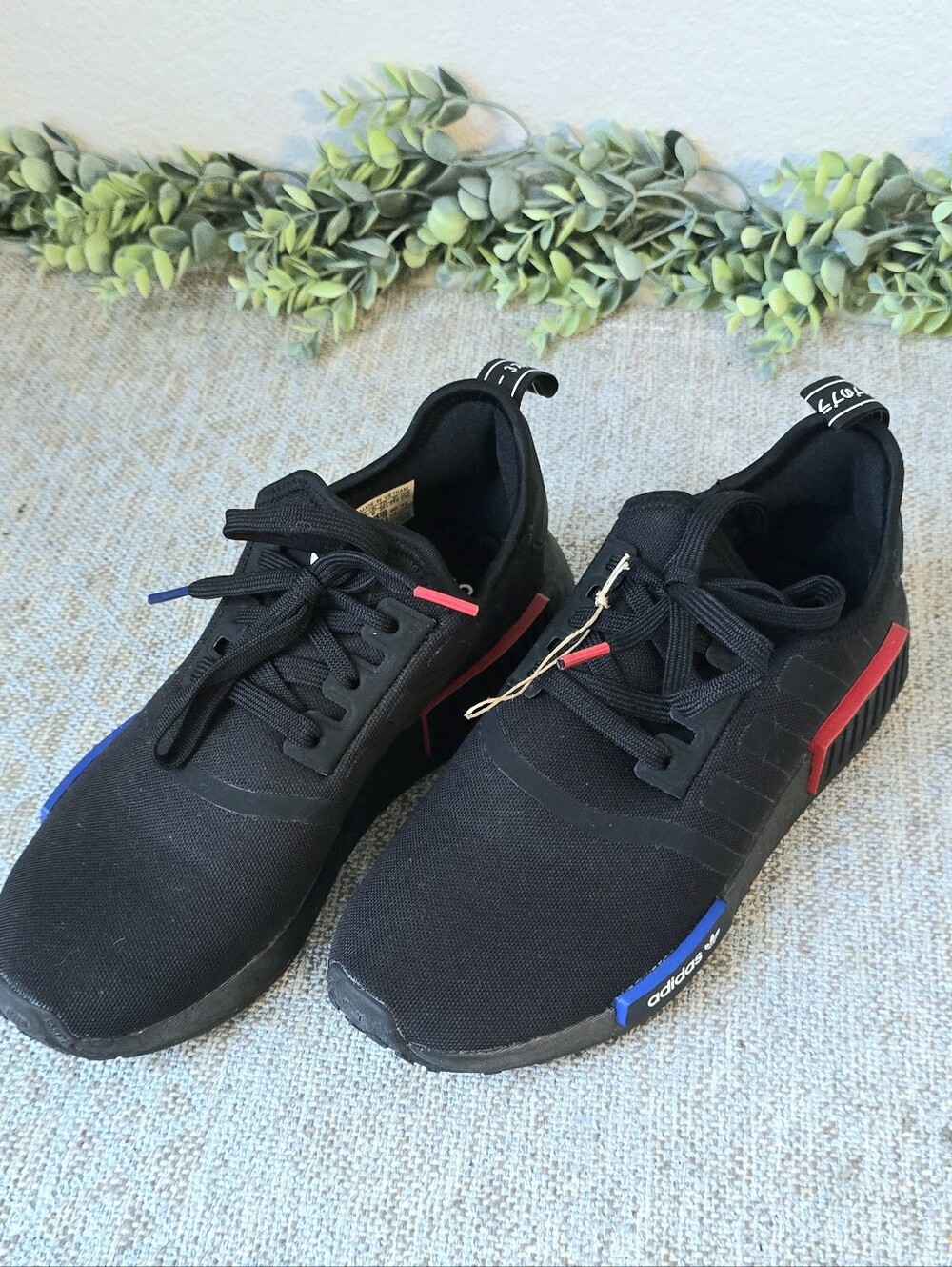 adidas NMD R1 Black Lo Top Sneakers with Red & Blue Accents